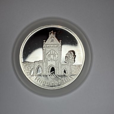 Silbern glänzende Medaille mit dem Wappen der Stadt Gransee und der Inschrift 29.8.1997.